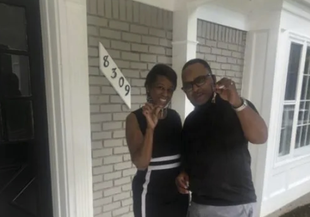 picture of Robert T. in front of a house